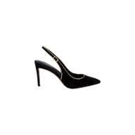 The Vichy Slingback Pump, crafted in black suede with a pointed toe and gold trim, features a stiletto slingback design and is displayed in side profile on a white background.