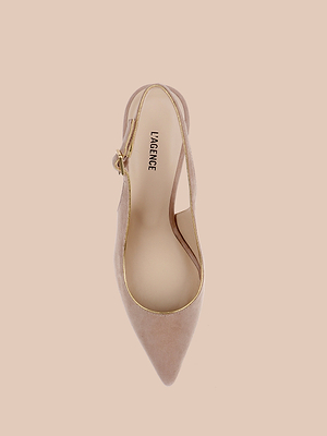 The Vichy Slingback Pump is a beige stiletto with a pointed toe, gold buckle, and elegant gold piping. Seen from above on a light beige background, its insole features the LAGENCE label.