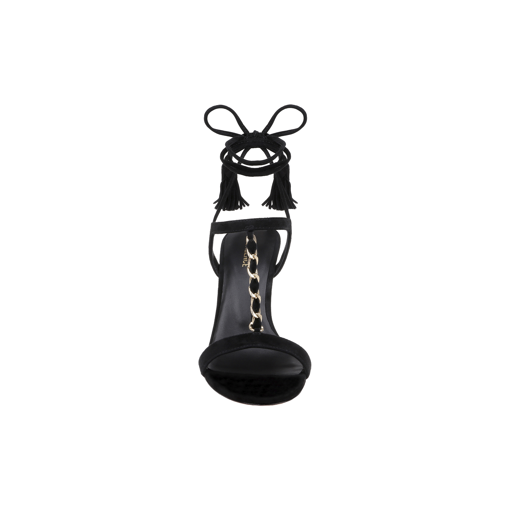 Front view of the Bond Suede Sandal in black, showcasing strappy heels with an ankle wrap featuring tassel accents and a gold chain detail along the insole, displayed against a white background.