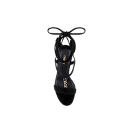 The Bond Suede Sandal, featuring black suede straps with an ankle tie, gold detailing on the front strap, and an open toe design, is photographed from above against a plain white background.