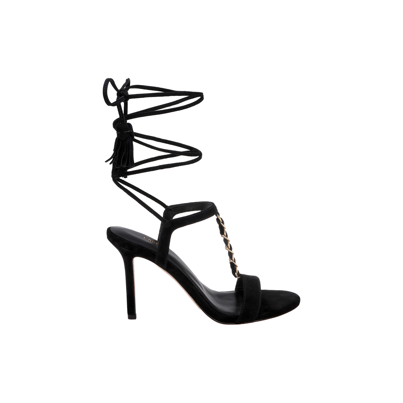 The Bond Suede Sandal is a black high-heeled shoe featuring a thin ankle wrap strap, gold chain detail across the front, an open toe, and stiletto strappy heel, displayed against a plain white background.