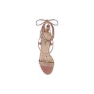 The Bond Suede Sandal, shown from above on a plain white background, is a blush-colored single sandal featuring an ankle strap with a bow and a strappy heel design.