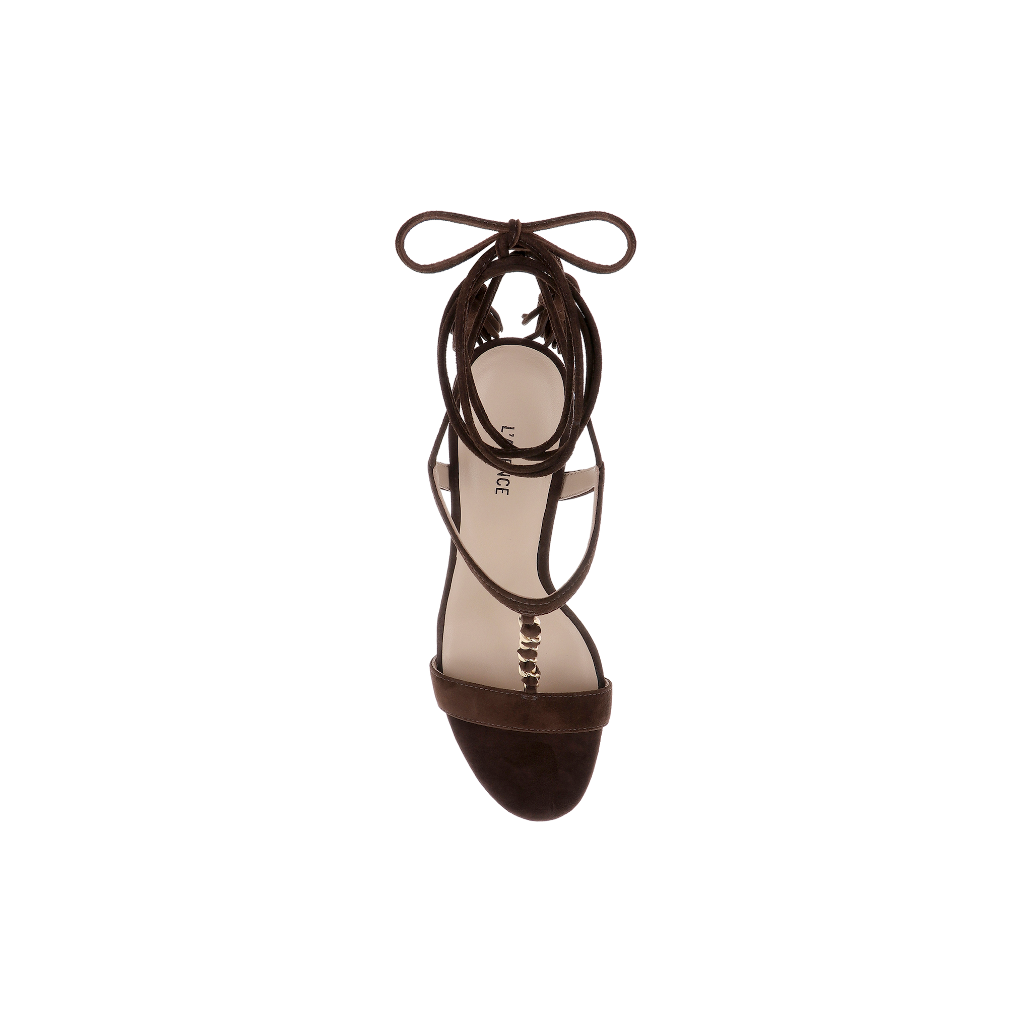 A single Bond Suede Sandal in dark brown is shown from above, highlighting its open toe, ankle strap, and bow-tied laces. This strappy heel showcases a minimalist, elegant design against a plain white background.