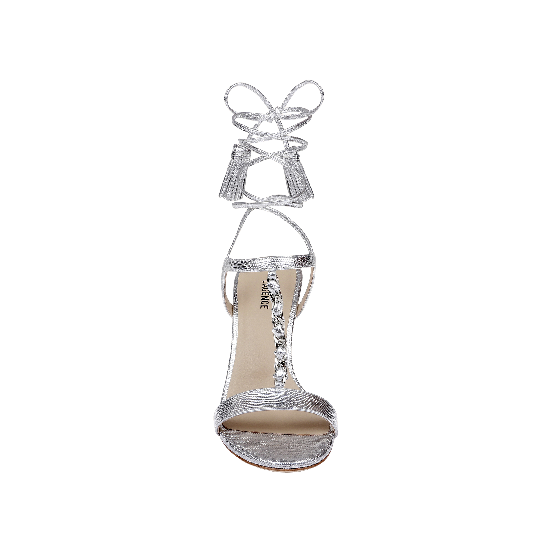 Bond Leather Sandal in silver leather, featuring a high heel and ankle wrap laces with tassel ends, designed with strappy details and gemstone embellishments along the T-strap, shown from above on a white background.
