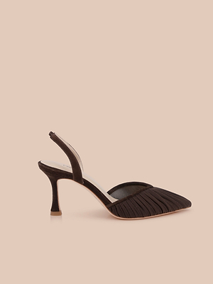 The Bowery Mesh Slingback Pump is a single black pointed-toe heel featuring a ruched mesh vamp and slim mid-height heel, shown against a light beige background.