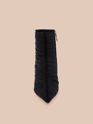 The Fulton Mesh Bootie is a black, ruched stiletto bootie with a pointed toe and side zipper, shown from the front against a beige background.