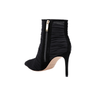 The Fulton Mesh Bootie features a black stiletto heel, a pointed toe, ruched mesh texture, and a gold side zipper, displayed against a plain white background.