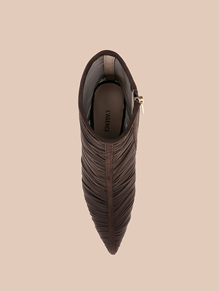 Top view of the Fulton Mesh Bootie in chocolate brown, featuring a textured pointed toe and a side zipper, displayed on a plain beige background.