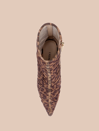Top view of the Fulton Mesh Bootie, featuring a pointed toe, brown and tan leopard print mesh, ruching detail, and a gold side zipper, set against a beige background.