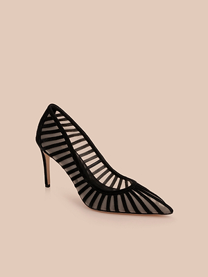 The Lenox Mesh Pump is a black suede, pointed-toe heel with a bold mesh upper and striking black stripes, shown against a neutral beige background.