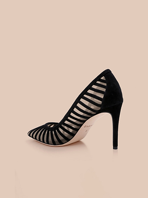 The Lenox Mesh Pump is a black heel with a pointed toe, featuring a mesh upper and black suede zebra-patterned stripes, shown against a plain beige background.