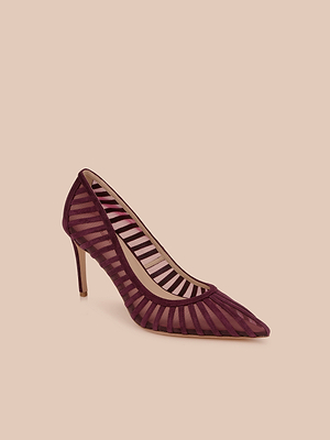 The Lenox Mesh Pump is a single burgundy suede heel featuring a pointed toe and semi-transparent striped mesh, showcased on a plain beige background.