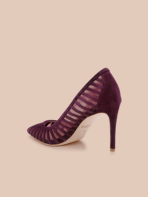 The Lenox Mesh Pump, a single deep purple heel with mesh and suede-like stripes, pointed toe, and stiletto silhouette, is showcased against a light beige background.