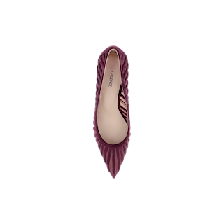 Top view of a single Lenox Mesh Pump in deep purple, featuring pointed toes, textured ribbed sides, and a smooth beige insole. Reminiscent of a classic suede pump, the product name “Lenox Mesh Pump” is printed inside on the heel area.