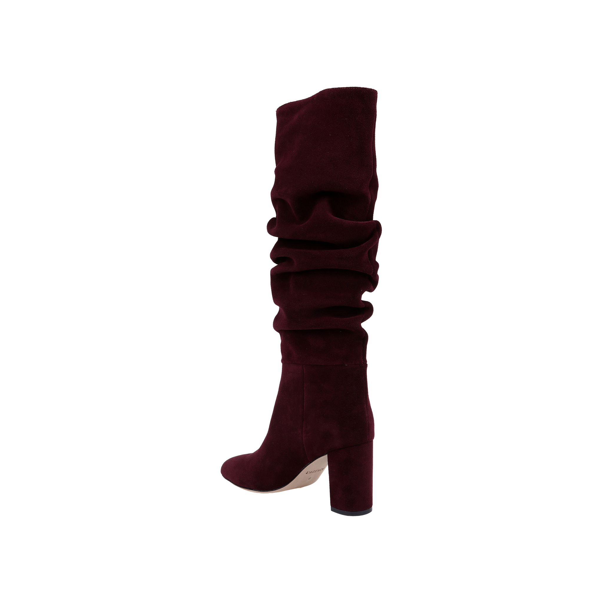 The Fletcher Boot—a knee-high, slouchy suede boot in rich burgundy, featuring a chunky block heel—is displayed on a plain white background, making it the perfect piece to add bohemian chic style to your look.