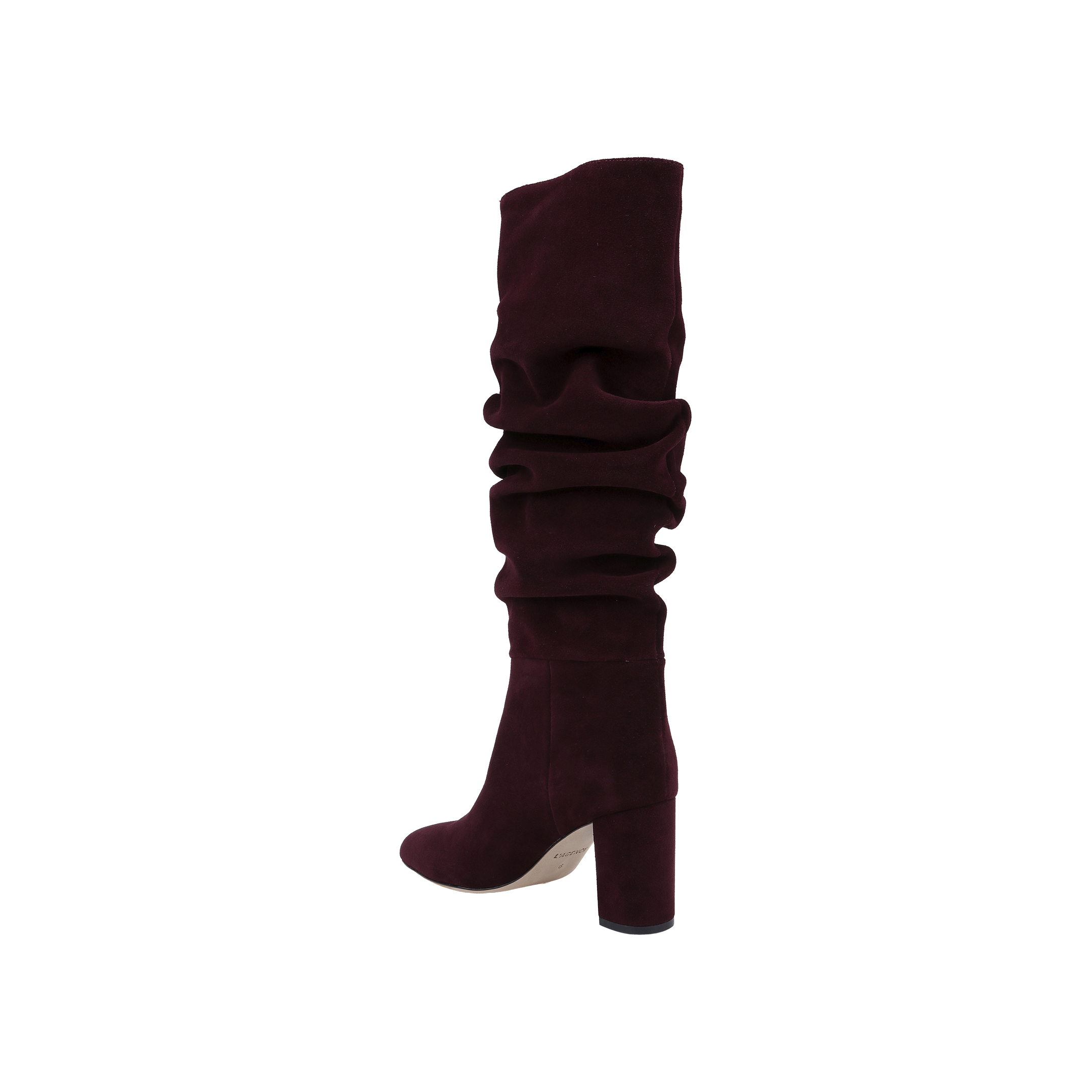 The Fletcher Boot—a knee-high, slouchy suede boot in rich burgundy, featuring a chunky block heel—is displayed on a plain white background, making it the perfect piece to add bohemian chic style to your look.