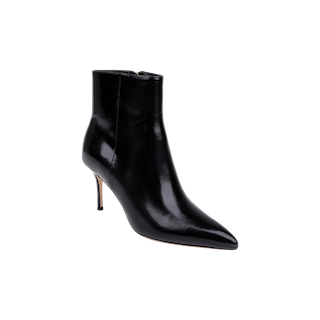 The Houston Bootie is a black, pointed-toe ankle boot with a high stiletto heel, side zipper, and glossy leather finish, shown on a plain white background—an elegant choice for elevating any look.