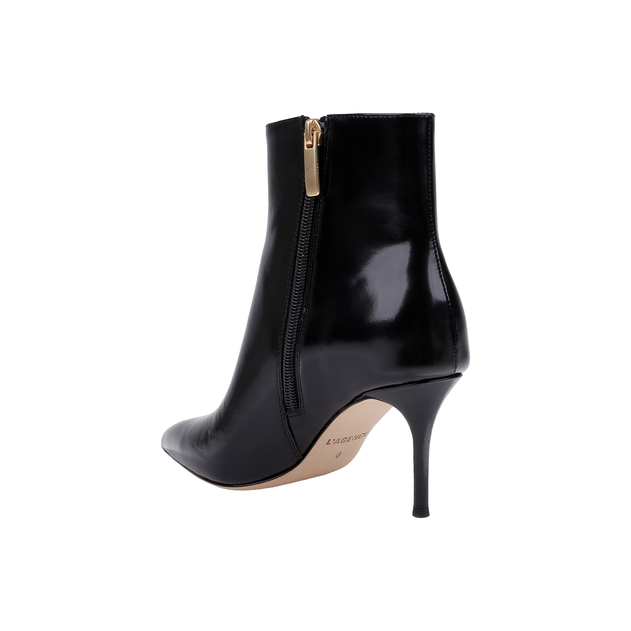 The Houston Bootie is a black leather ankle bootie featuring a pointed toe, side zipper, and stiletto heel, shown against a white background.