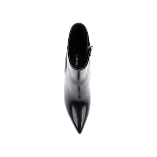 Top view of a single Houston Bootie in black leather with a pointed toe and side zipper, displayed against a white background. The brand name LAGENCE is visible inside the shoe.