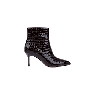 The Houston Bootie is a black, crocodile-embossed patent leather ankle bootie with a pointed toe and high stiletto heel, shown in profile against a plain white background.