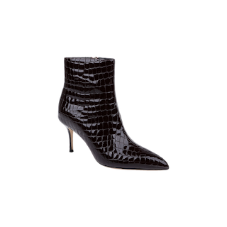 The Houston Bootie, crafted from black crocodile-embossed patent leather, features a pointed toe and a thin high heel, and is displayed on a plain white background.