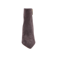 The Houston Bootie is a single dark gray suede heeled bootie with a pointed toe and side zipper, photographed from the front against a plain white background.