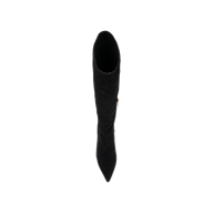 The Herald Boot, a black suede knee-high style featuring a pointed toe and stiletto heel, is pictured from above against a plain white background.