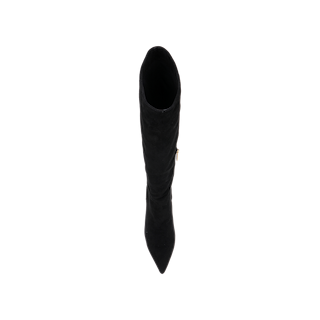 The Herald Boot, a black suede knee-high style featuring a pointed toe and sleek stiletto heel, is displayed from above on a clean white background.