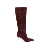 The Herald Boot, a single knee-high design in dark burgundy suede with a pointed toe and stiletto heel, is shown from the side against a plain white background and exemplifies the classic elegance often found in suede knee-high boots.