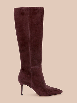 Herald Boot: A single knee-high, pointed-toe boot in burgundy suede with a slim stiletto heel, displayed on a neutral beige background.