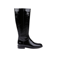 The Cortland Boot—a shiny black patent leather knee-high boot with a low heel—is displayed in profile on a plain white background.