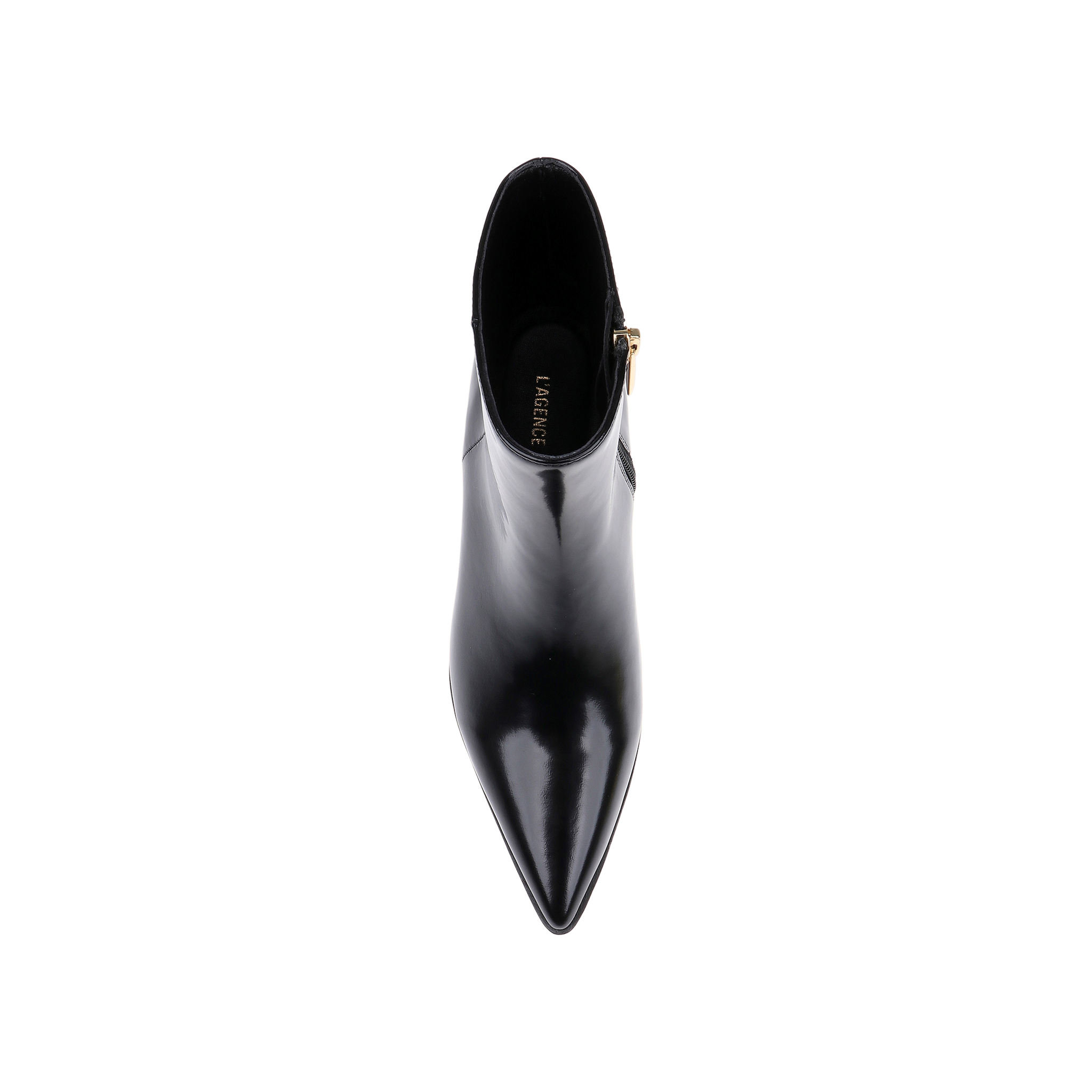 Top view of a single Vesey Bootie in black leather with a shiny, pointed toe and side zipper, featuring the brand name CHARLES  KEITH on the insole, set against a plain white background.