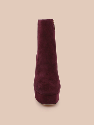 Front view of a single Soho Bootie in burgundy suede, featuring a stylish block heel and platform sole, set against a plain beige background.