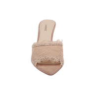The Penn Mule, displayed from above on a white background, is a single beige slip-on featuring an open pointed toe and delicate lace detailing across the front.