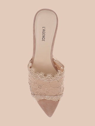 A single Penn Mule shoe in beige, featuring a pointed toe and a wide strap elegantly covered in lace. The memory foam insole provides extra comfort and is printed with the LAGENCE brand name. The shoe is displayed against a solid light beige background.