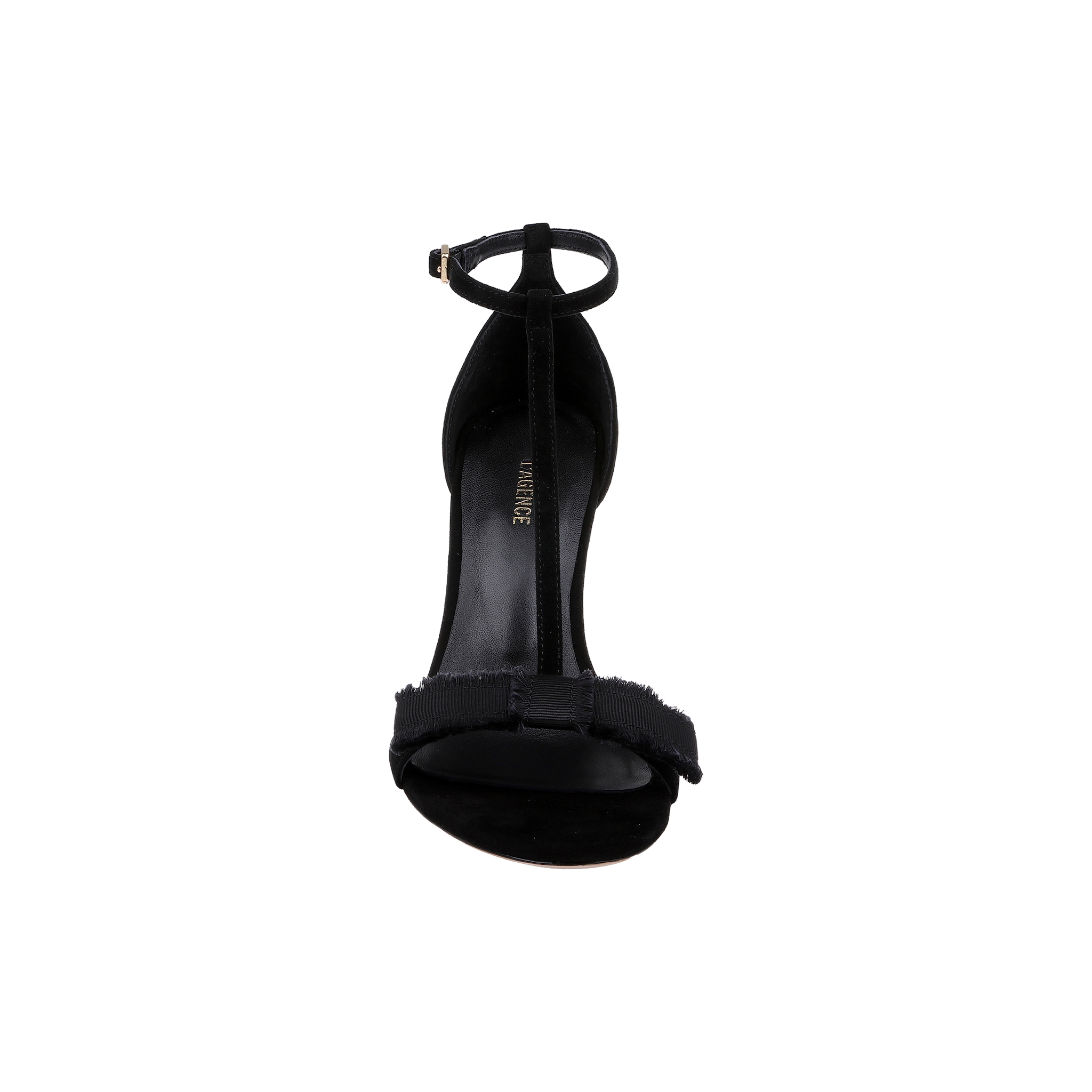 The Lerner Sandal is a black high-heeled T-strap sandal with an ankle strap and a bow detail on the front strap, featuring a suede upper and stiletto heel, shown from the front against a plain white background.