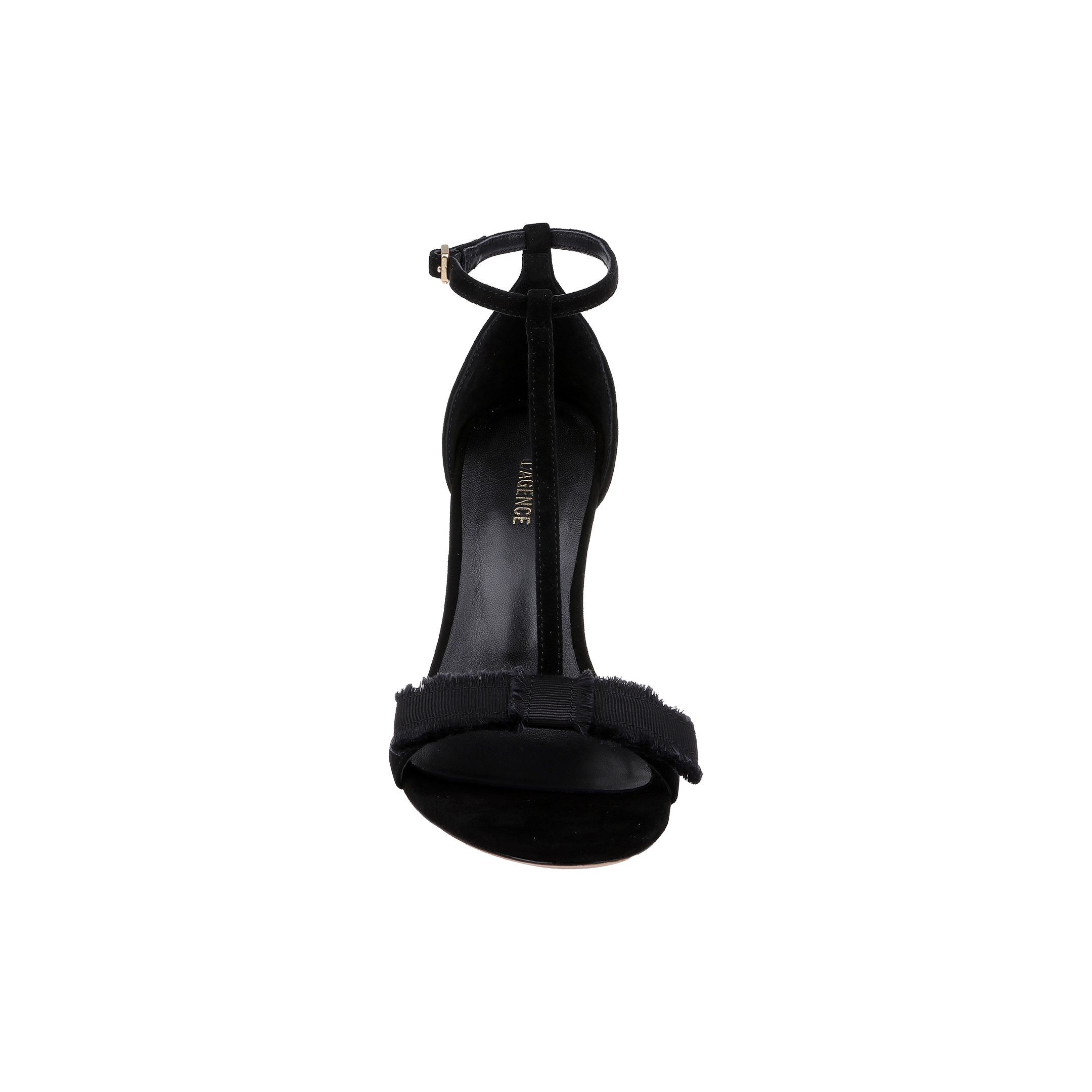 The Lerner Sandal is a black high-heeled T-strap sandal with an ankle strap and a bow detail on the front strap, featuring a suede upper and stiletto heel, shown from the front against a plain white background.