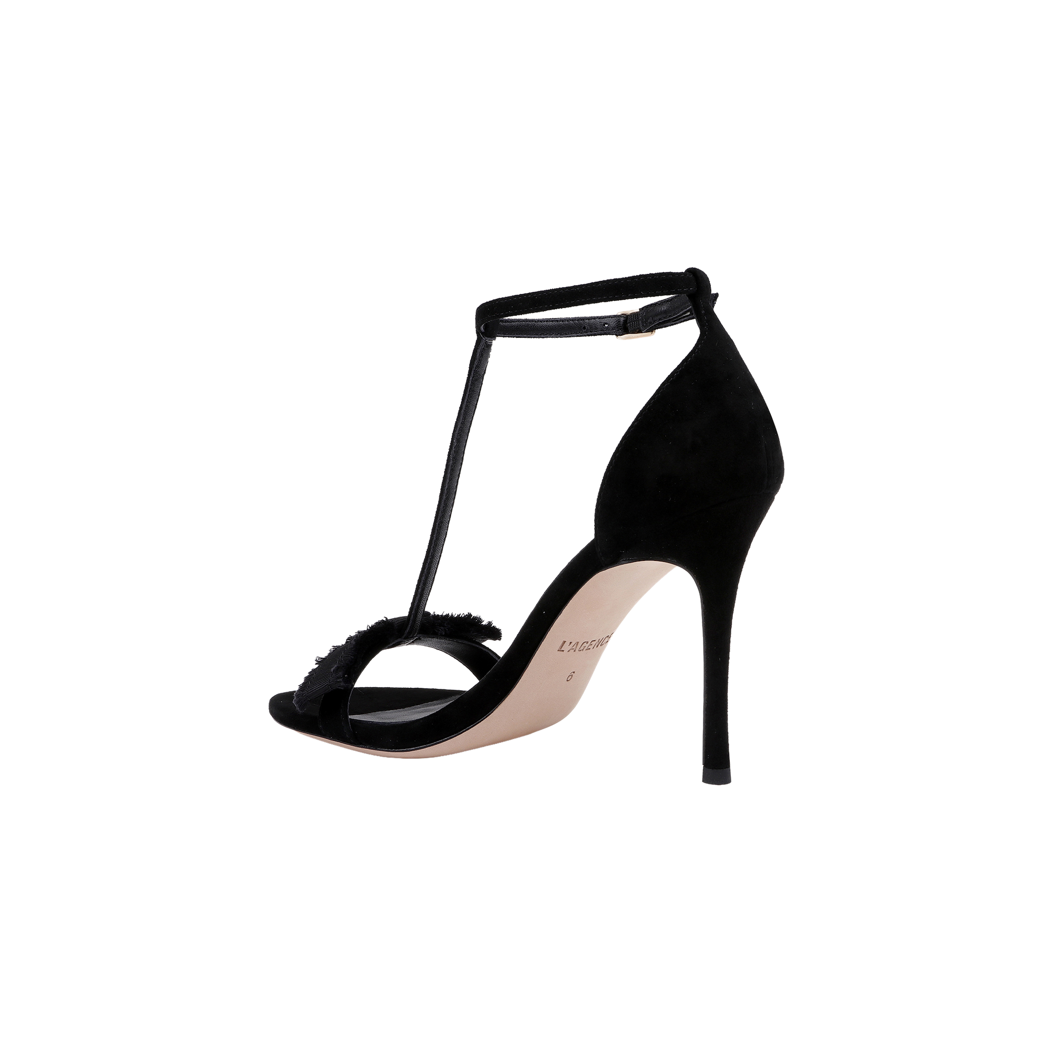 The Lerner Sandal is a black, suede T-strap sandal featuring a slim stiletto heel, open toe, and thin ankle strap, shown against a plain white background.