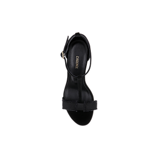 The Lerner Sandal is a black open-toe high heel viewed from above, showcasing a sleek front strap, an ankle strap with buckle closure, and a sophisticated stiletto heel. Crafted with a suede upper, this sandal also features the brand name “Lerner” printed on the insole.