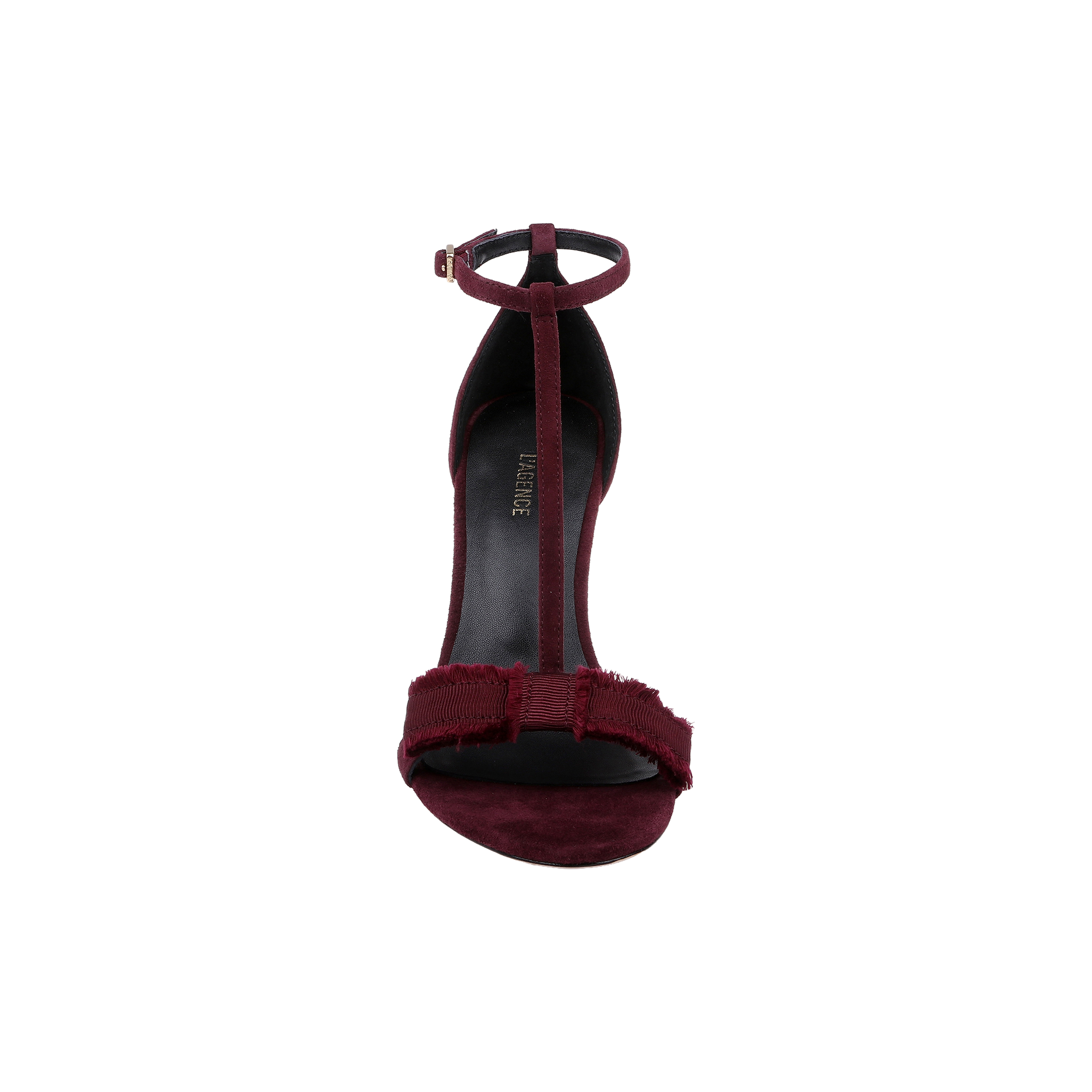 Front view of the Lerner Sandal in burgundy—a T-strap stiletto heel featuring an ankle strap and a fabric bow accent on the suede upper toe strap.