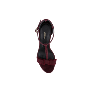 Top view of a single Lerner Sandal in burgundy, featuring a suede upper, ankle strap, and bow detail on the toe, displayed on a plain white background.