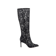 The Chambers Boot, a knee-high black lace boot with a stiletto heel and pointed toe, is displayed against a plain white background.