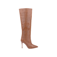 The Lafayette Boot in tan lizard-embossed leather showcases a brown, knee-high silhouette with a pointed toe and reptile-inspired textured pattern, elevated on a high stiletto heel and displayed against a plain white background.