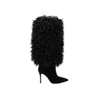 The Sheridan Boot is a single black stiletto heel boot featuring a pointed toe and a tall, shaggy, textured upper crafted from curly faux fur, displayed against a plain white background.
