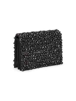 The Victoire Crystal Clutch is a rectangular black clutch adorned with sparkling black beads and crystals, creating a textured, glamorous look—a handcrafted statement piece perfect for elevating your evening collection.