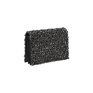 The Victoire Crystal Clutch, a petite black evening bag adorned with sparkling faceted stones, is pictured at an angle against a plain white background—an exquisite accessory that encapsulates the essence of evening glamour for your clutch collection.