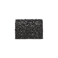 The Victoire Crystal Clutch is a rectangular black clutch bag, featuring a textured surface adorned with shiny black beads. Handcrafted with exquisite detail, this elegant accessory exudes evening glamour as it is showcased against a plain white background.
