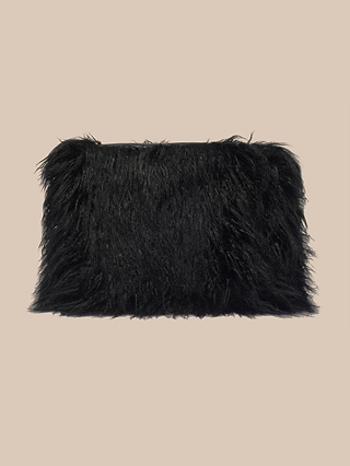 The Adelina Faux Fur Clutch, featuring plush black faux fur, is displayed against a plain beige background, making it a striking statement accessory for any outfit.