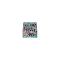 Enyo Cover-Up Short in a boho style pull-on design, featuring a vibrant blue, teal, and burgundy paisley print with a gold chain belt.