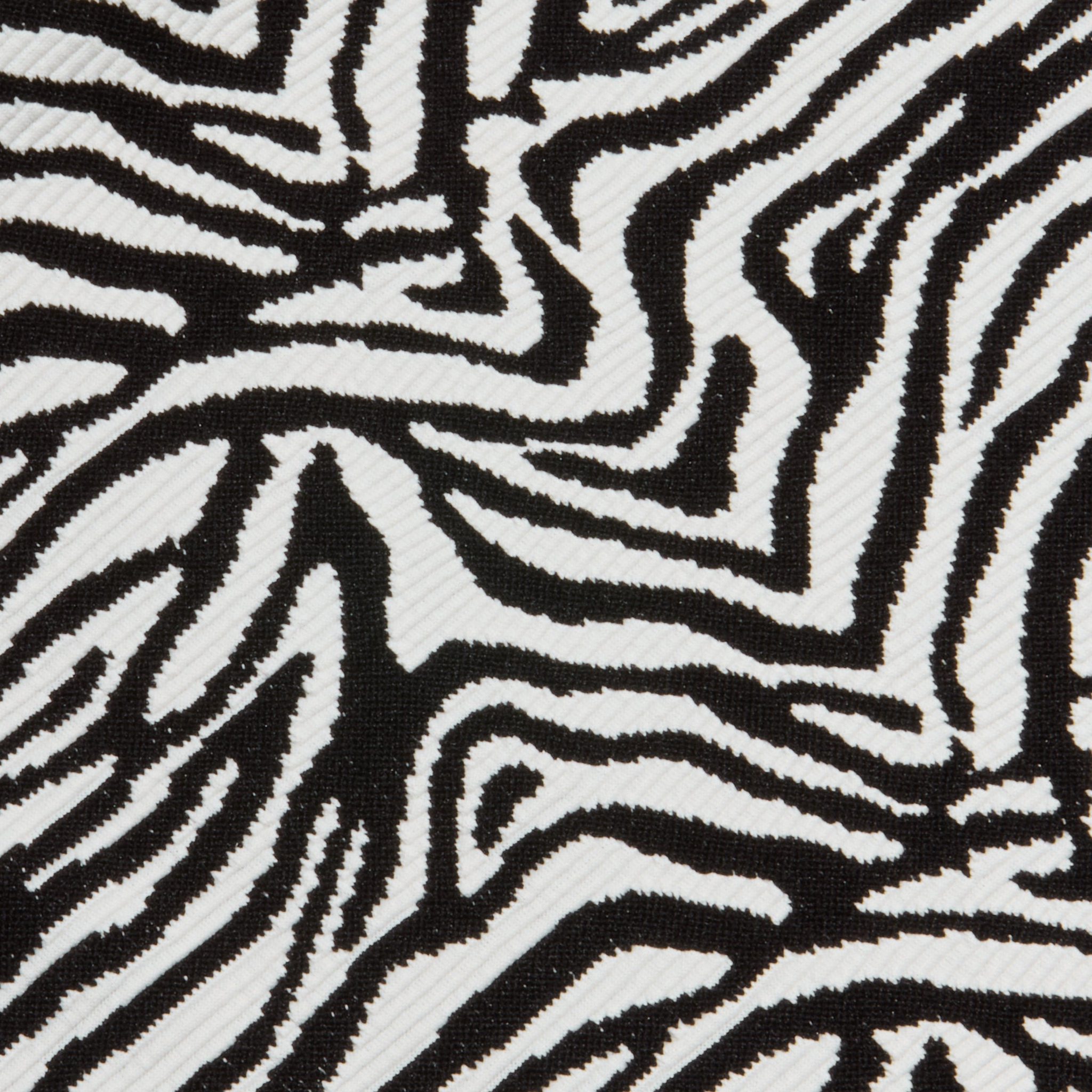Close-up of the Lexie Bikini Top in a black and white zebra print with irregular, wavy stripes.